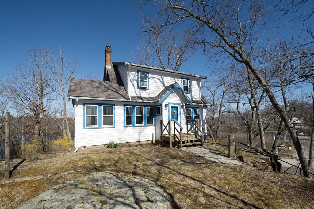 86 Westminster Road Weymouth, MA 02189 - Photo 3 of 15 a front view of a house with a yard