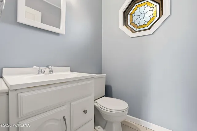 a bathroom with a sink and a toilet