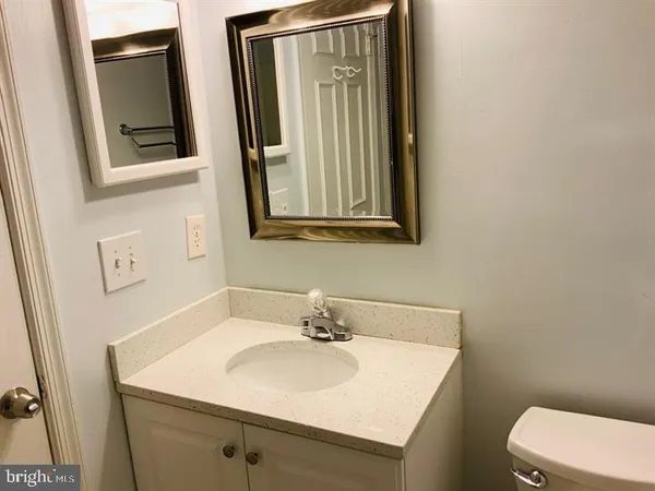 a bathroom with a sink and a toilet