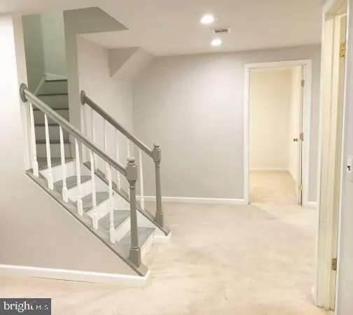 a bathroom with a shower toilet and sink