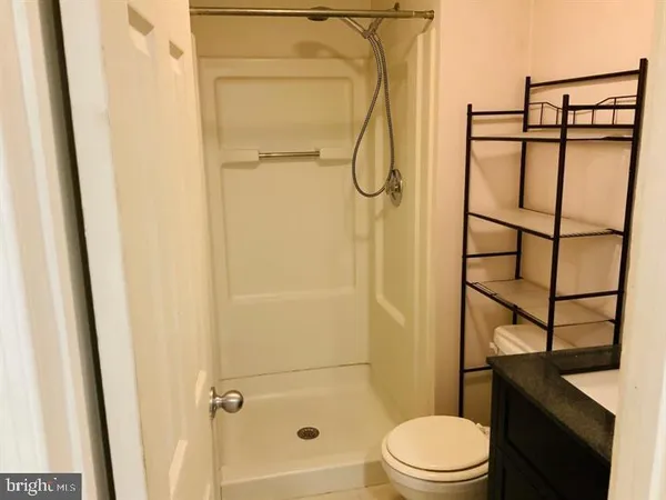 a close up of a utility room with dryer and washer