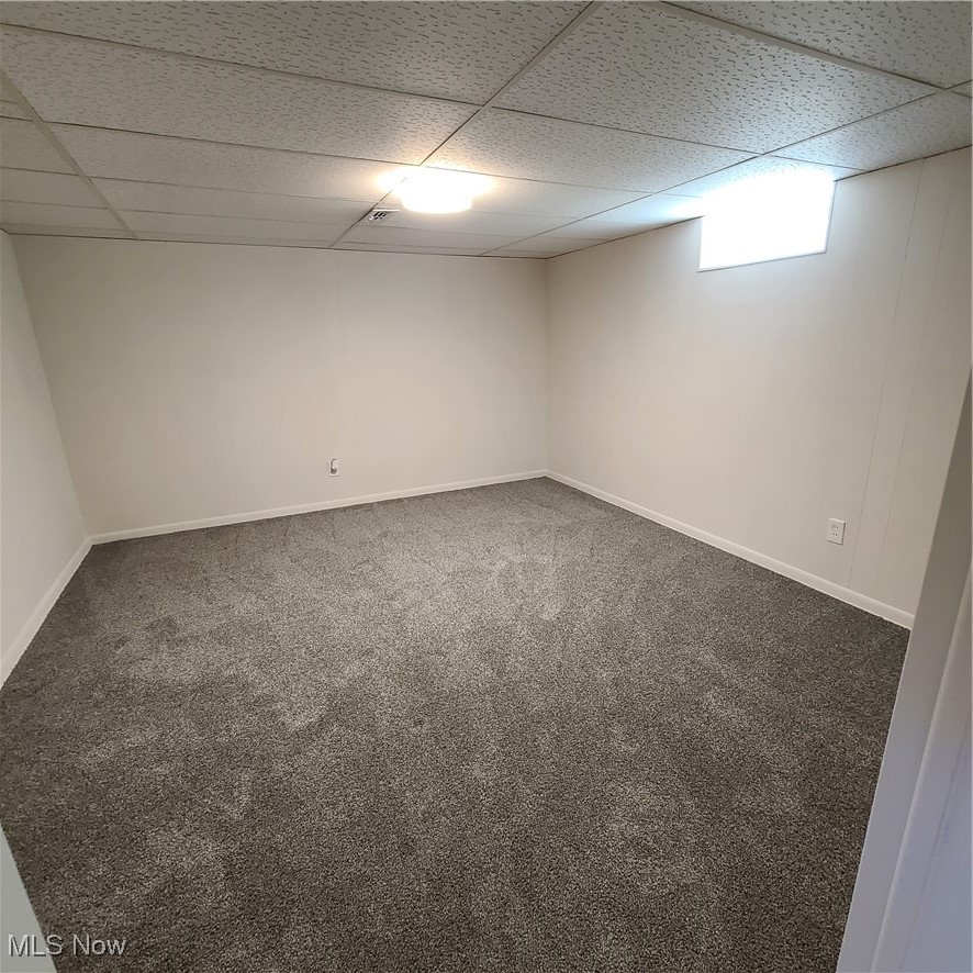 12204 Grannis Road Garfield Heights, OH 44125 - Photo 17 of 22 Finished separate room in the basement with fresh pain and new carpeting, new ceiling fixture.