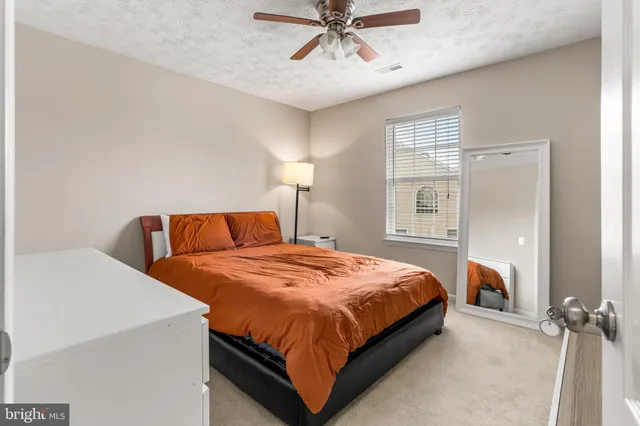 a bathroom with a bathtub a shower and a sink