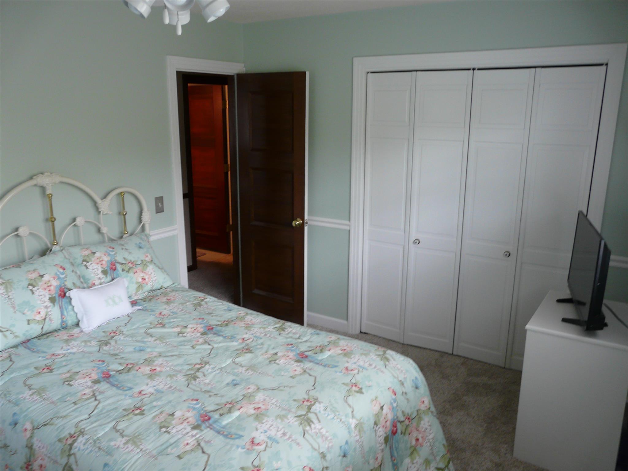 5333 Overton Road Nashville, TN 37220 - Photo 13 of 18 Bedroom with larger closet and ceiling fan.