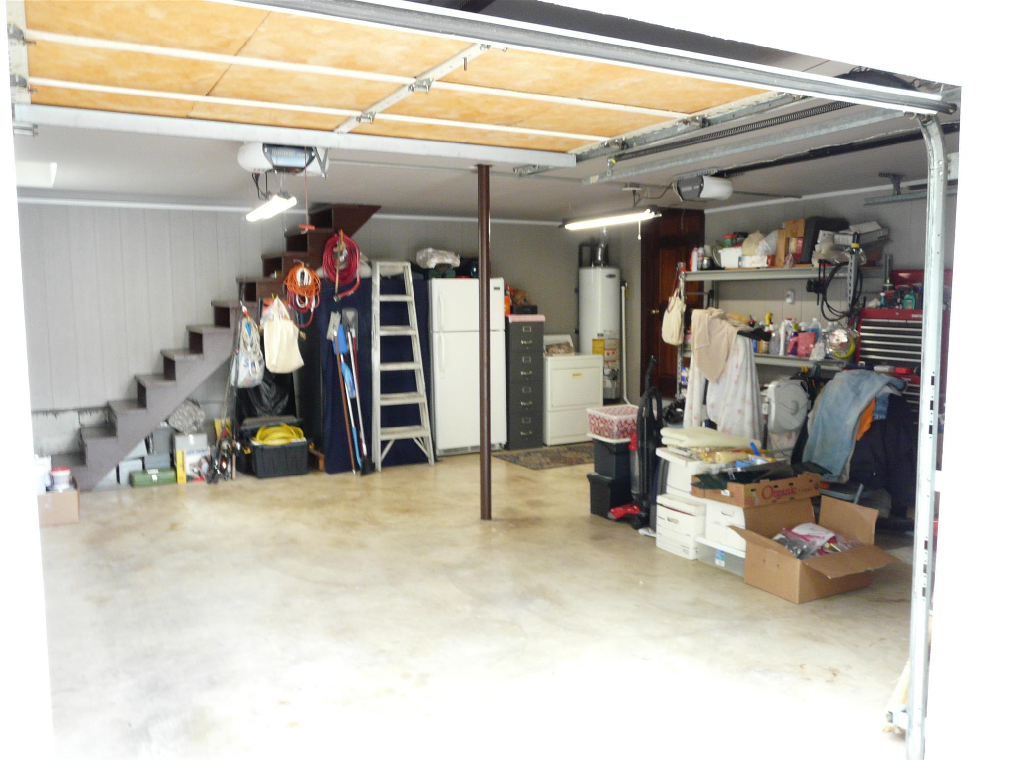 5333 Overton Road Nashville, TN 37220 - Photo 17 of 18 Inside view of 2 car garage with steps leading to floored attic space (could be interior expansion of 250 square feet.