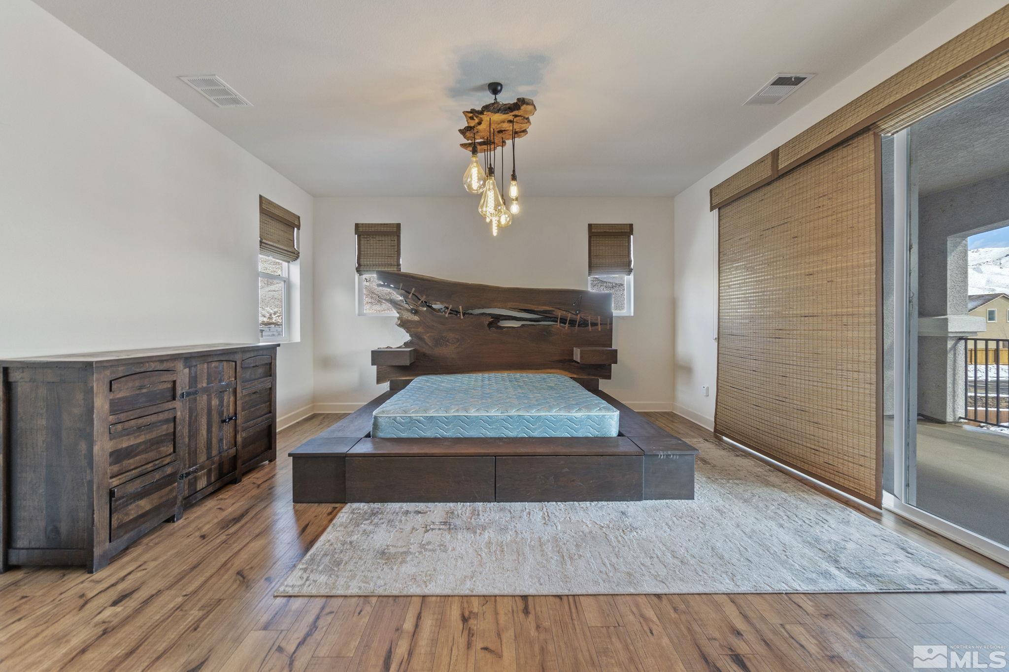 2320 Patayan Road Reno, NV 89521 - Photo 23 of 36 a living room with furniture and wooden floor