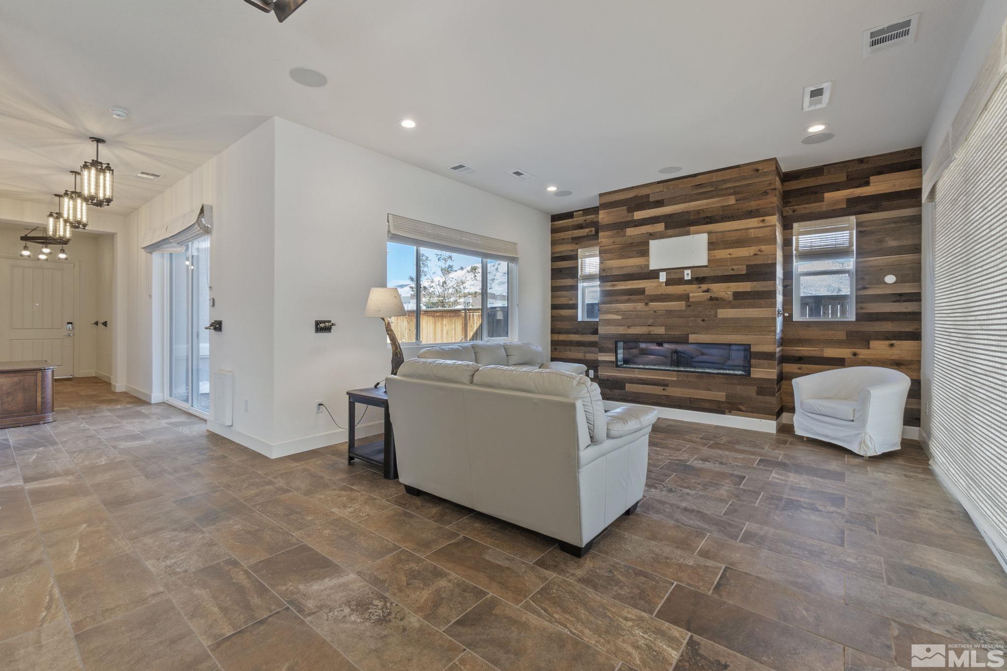 2320 Patayan Road Reno, NV 89521 - Photo 6 of 36 a living room with furniture and a large window