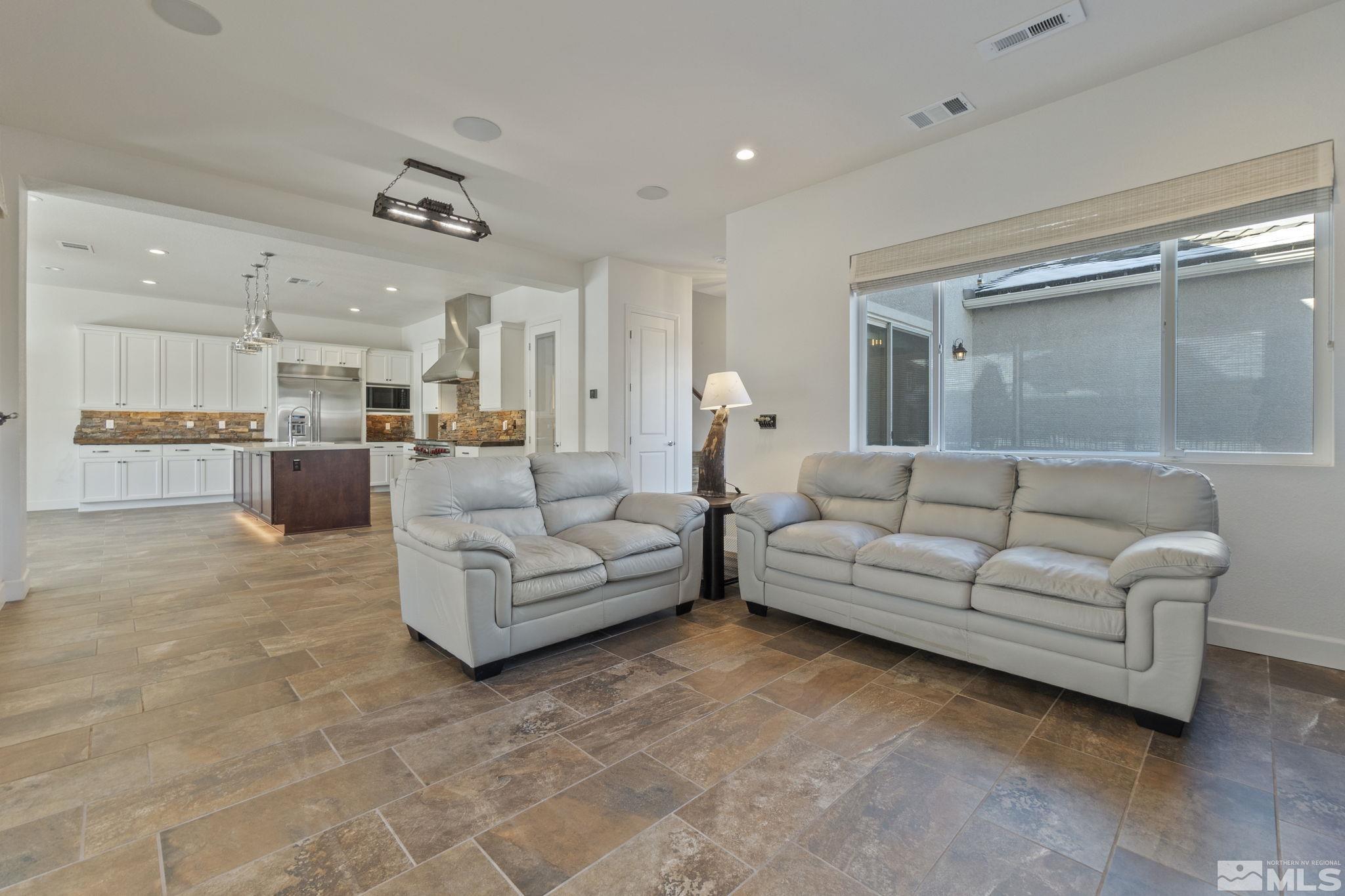 2320 Patayan Road Reno, NV 89521 - Photo 7 of 36 a living room with furniture and kitchen view