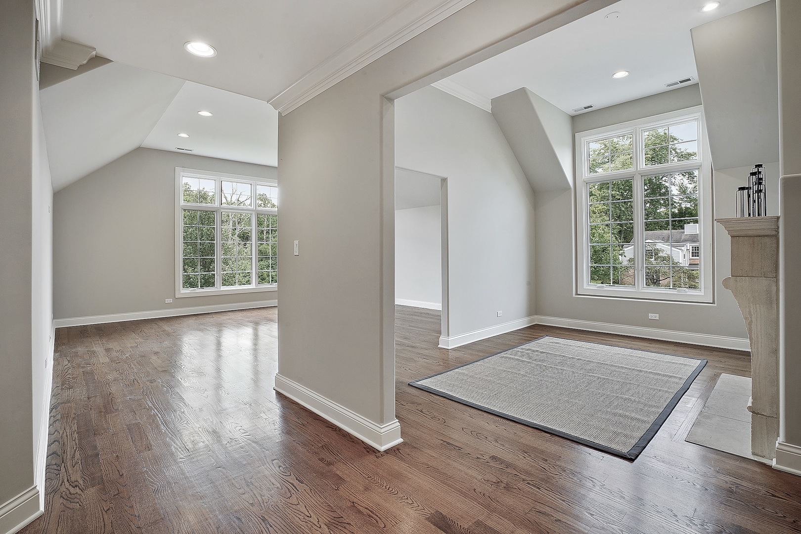 1004 Lee Road Northbrook, IL 60062 - Photo 17 of 30 an empty room with wooden floor and windows