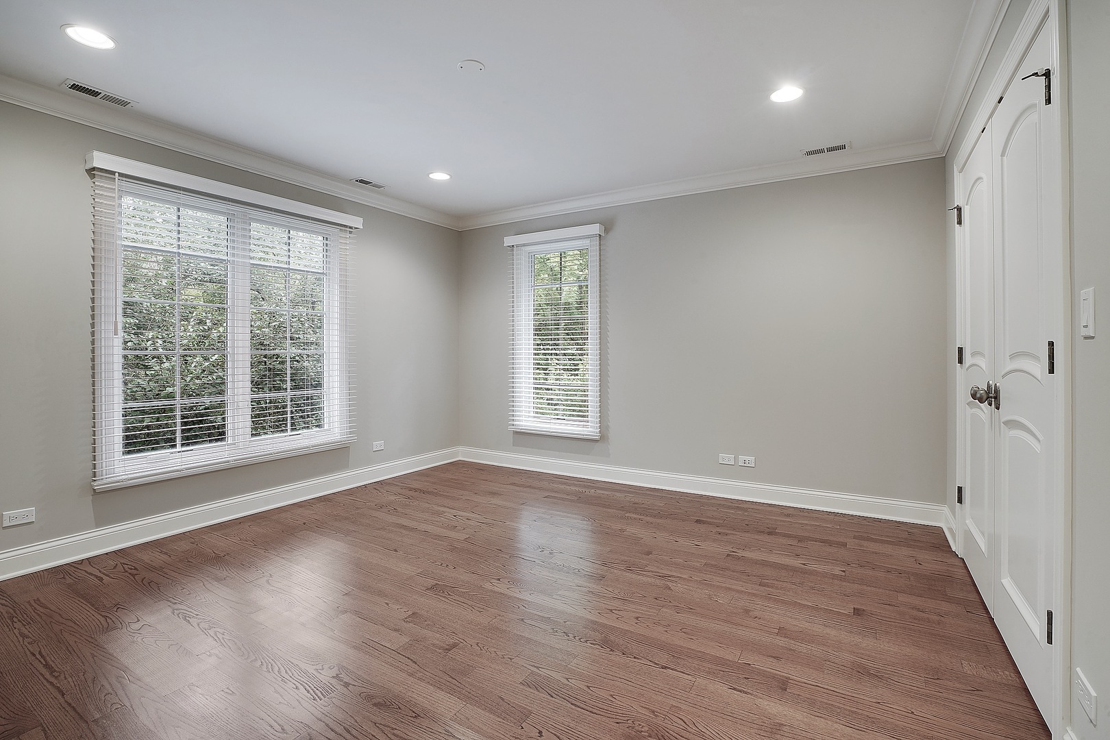 1004 Lee Road Northbrook, IL 60062 - Photo 24 of 30 a view of an empty room with wooden floor and a window