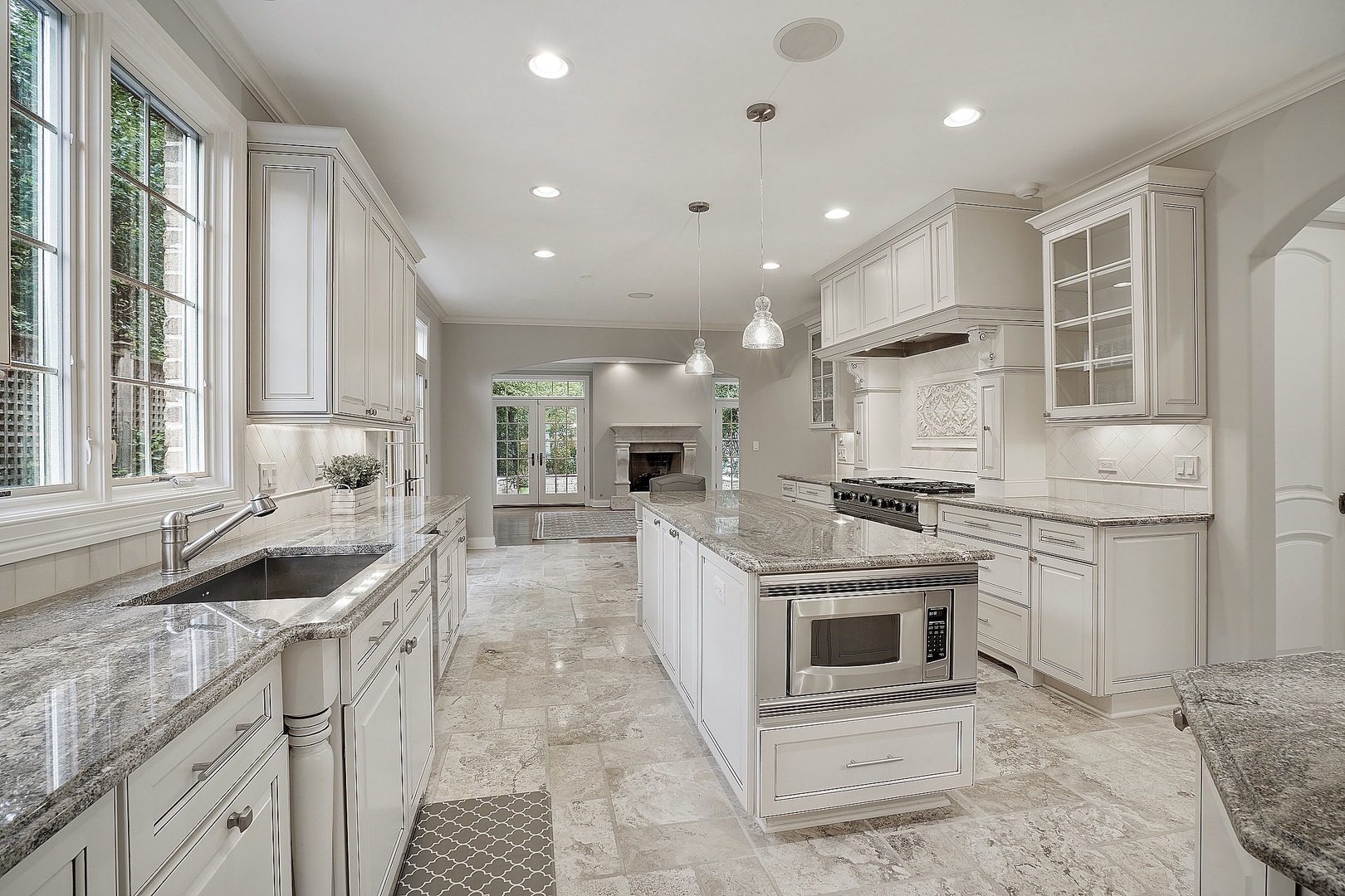 1004 Lee Road Northbrook, IL 60062 - Photo 9 of 30 a kitchen with a sink stove and cabinets