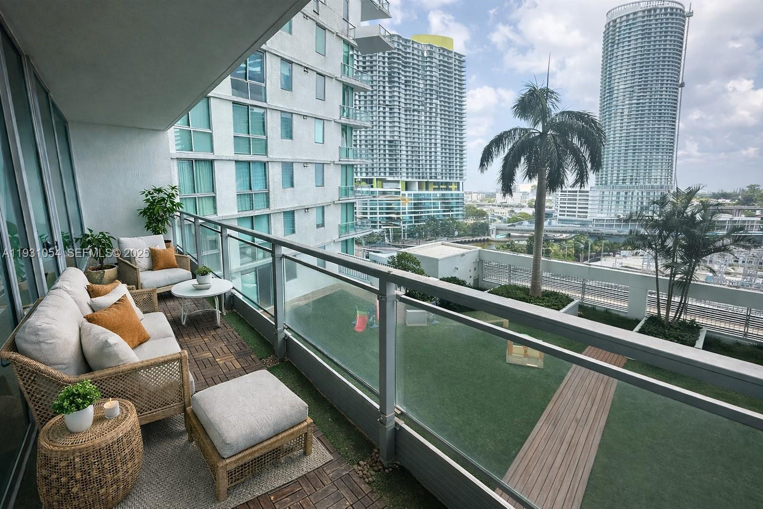 92 Southwest 3rd Street, Unit 1408 Miami, FL 33130 - Photo 4 of 15 a view of swimming pool with a lounge chair