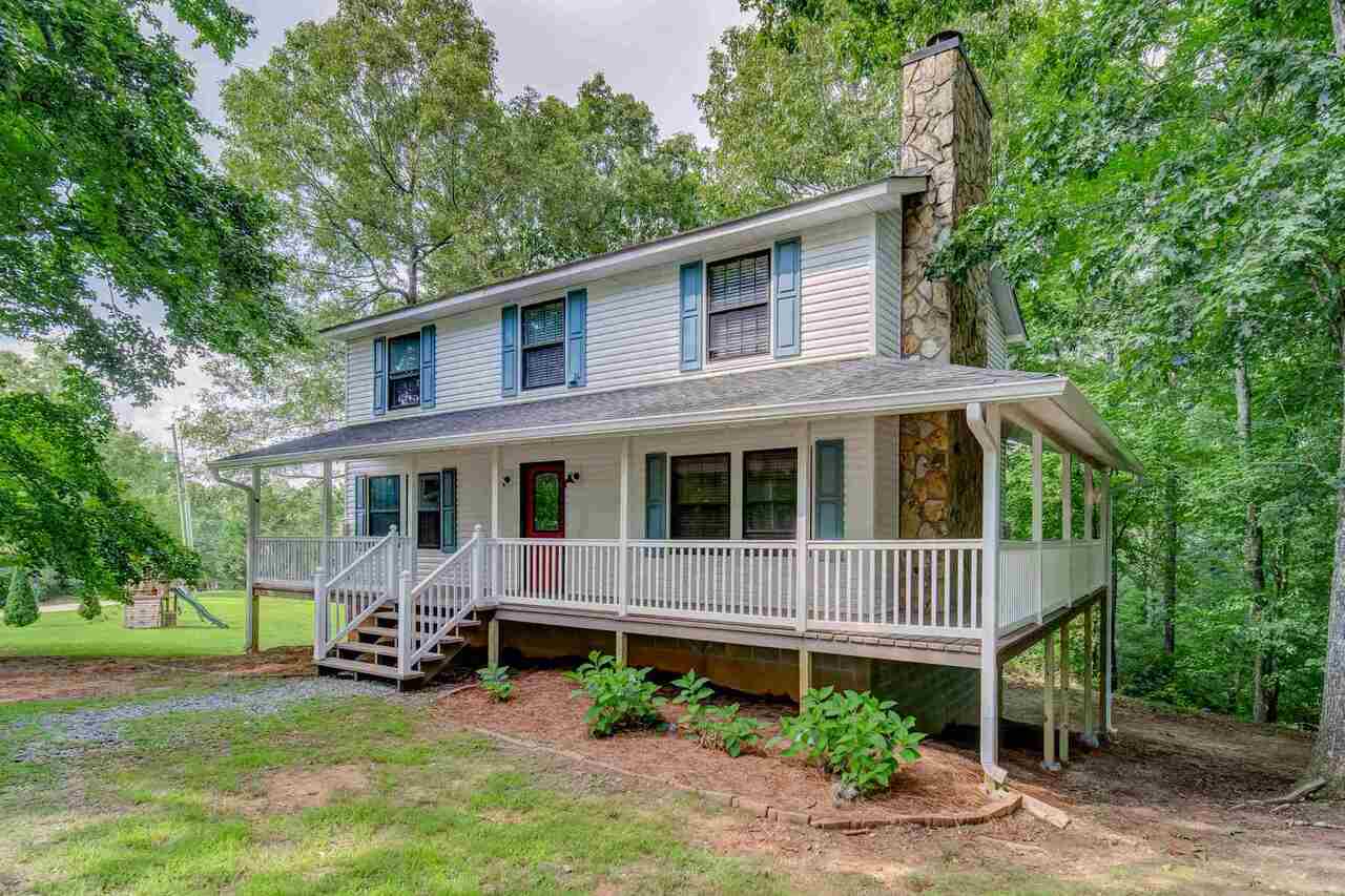 100 Windy Valley Lane, Unit 189 Blue Ridge, GA 30513 - Photo 1 of 1 a view of a house with a yard and sitting area