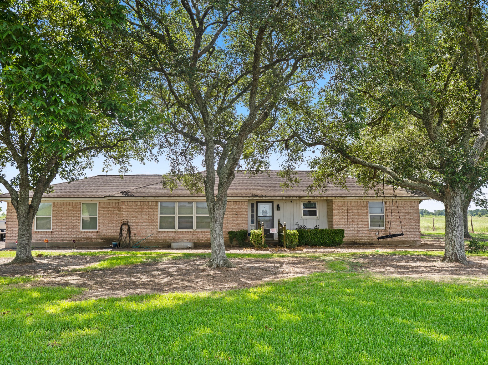 9919 Bohacek Road Beasley, TX 77417 - Photo 42 of 46 a front view of a house with a yard