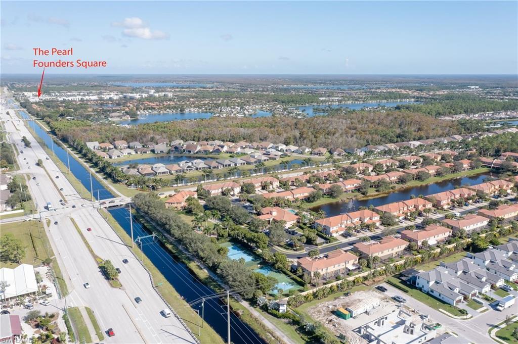 7658 Bristol Circle Naples, FL 34120 - Photo 32 of 32 an aerial view of city and mountain