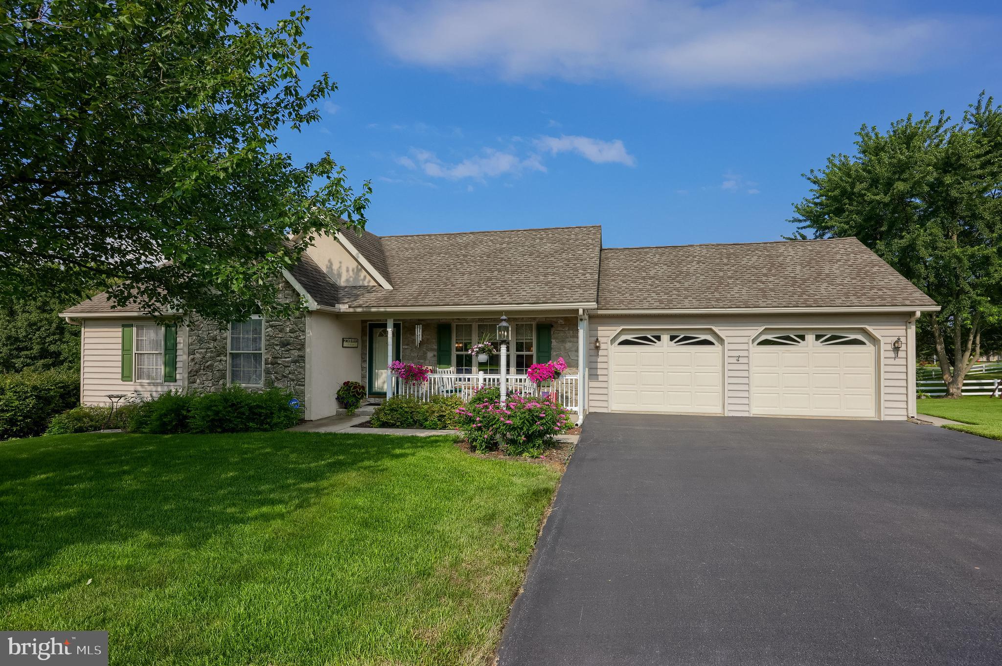 23 Field Lane Lititz, PA 17543 - Photo 54 of 56 a front view of a house with a yard and garage