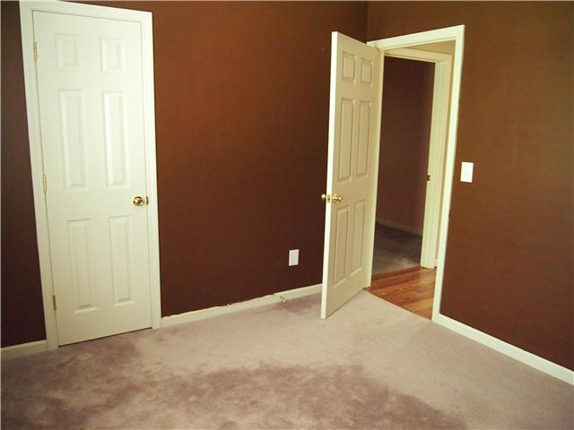 3494 Booker Ridge Road Mount Pleasant, TN 38474 - Photo 12 of 20 Second Bedroom is across from the bathroom and faces the wooded side of house