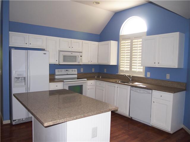 3494 Booker Ridge Road Mount Pleasant, TN 38474 - Photo 18 of 20 Hardwood floors and island with a nice granite countertop
