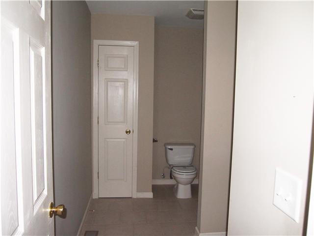 3494 Booker Ridge Road Mount Pleasant, TN 38474 - Photo 9 of 20 Bathroom with nice size linen closet and recessed area for the sink and mirror