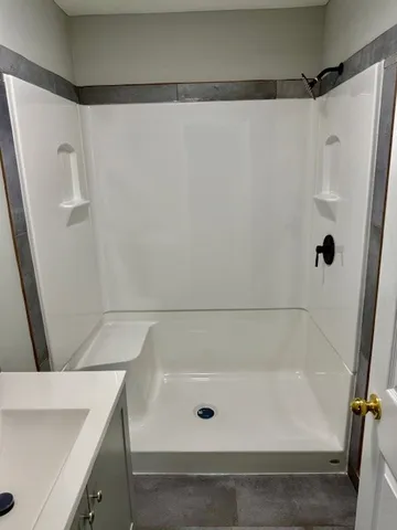 a bathroom with a bathtub