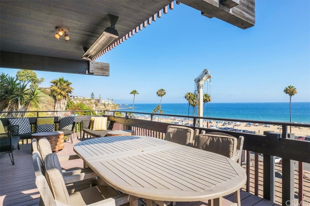 3047 Ocean Boulevard Corona del Mar, CA 92625 - Photo 15 of 53 a kitchen with sink and view of living room