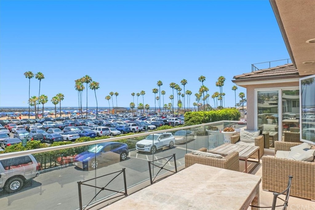 3047 Ocean Boulevard Corona del Mar, CA 92625 - Photo 40 of 53 a view of swimming pool with outdoor seating