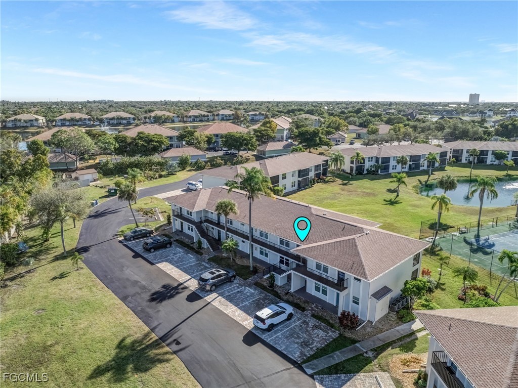 16007 Davis Road, Unit 524 Fort Myers, FL 33908 - Photo 27 of 36 a view of a city with an ocean
