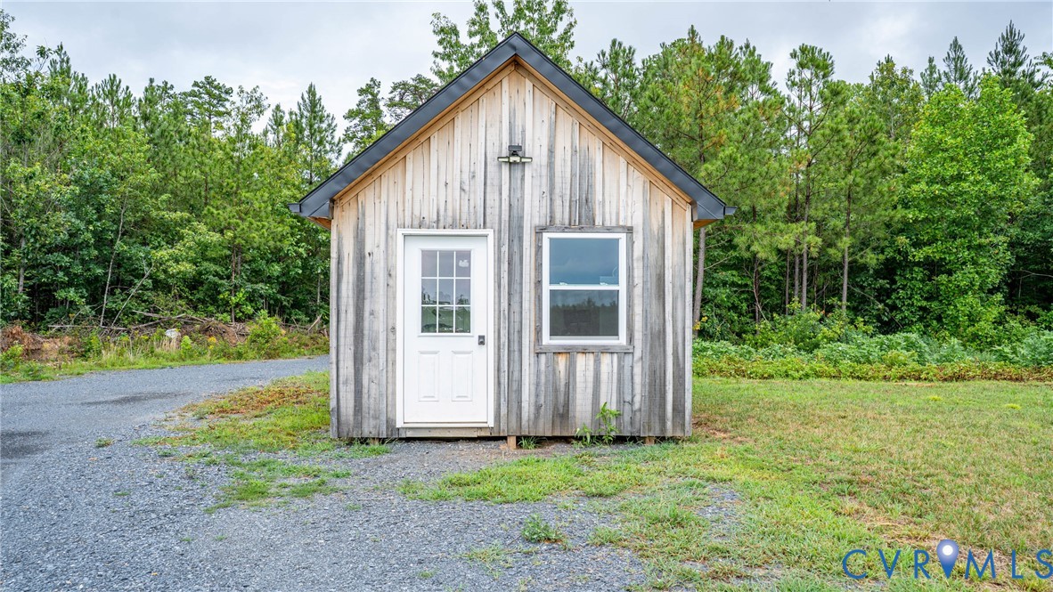 1451 Dixie Hill Road Dillwyn, VA 23936 - Photo 42 of 51 Wood-sided structure featuring a white paneled doo