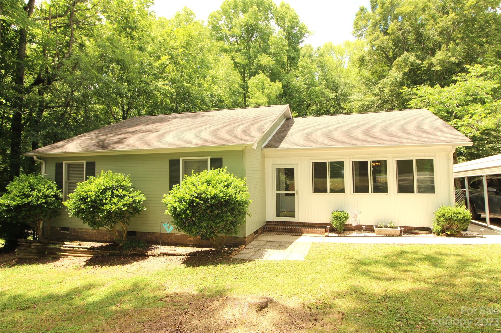 a view of a house with a swimming pool