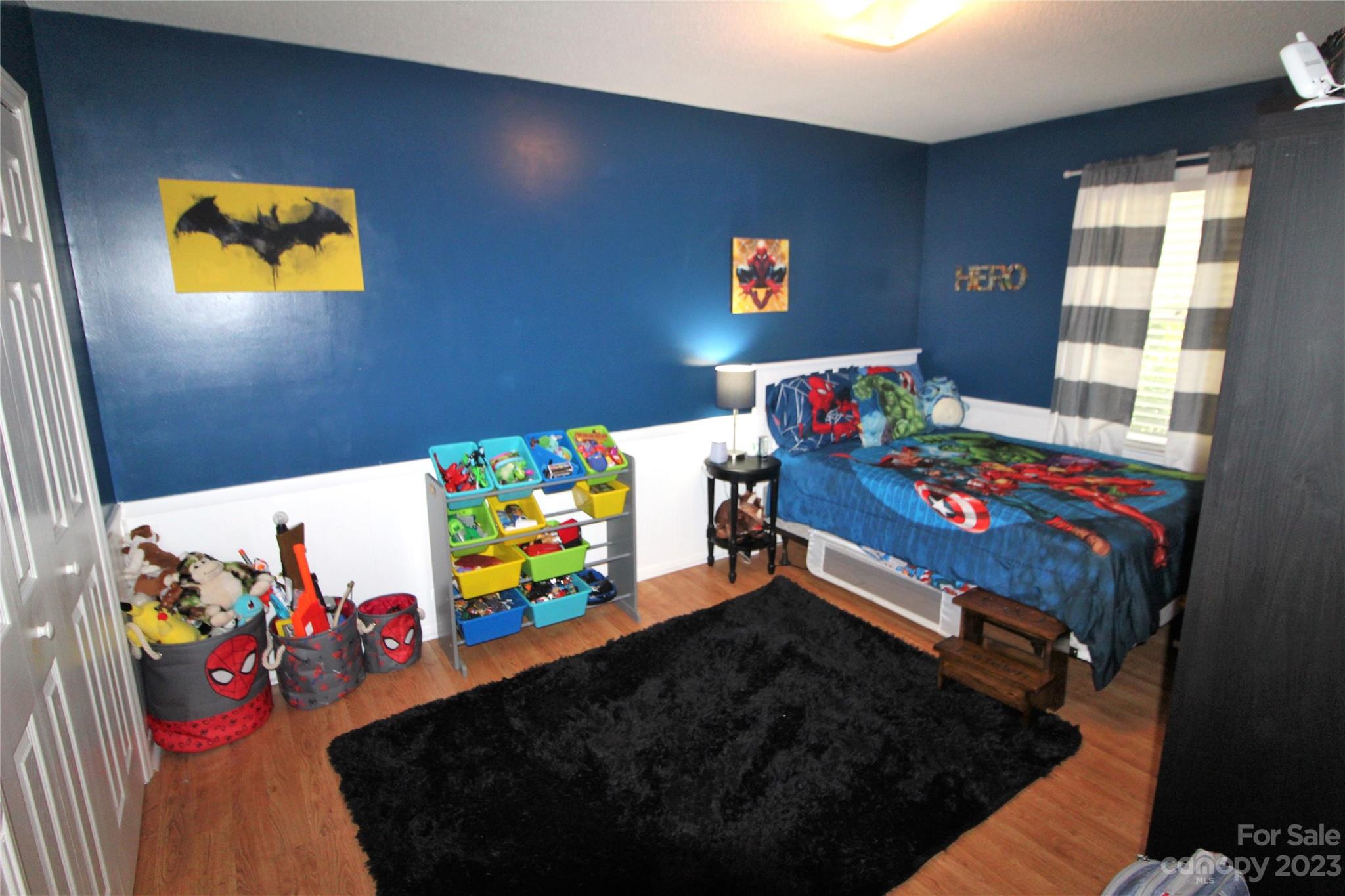 104 McCall Street Clover, SC 29710 - Photo 13 of 22 a bedroom with a bed and a couch