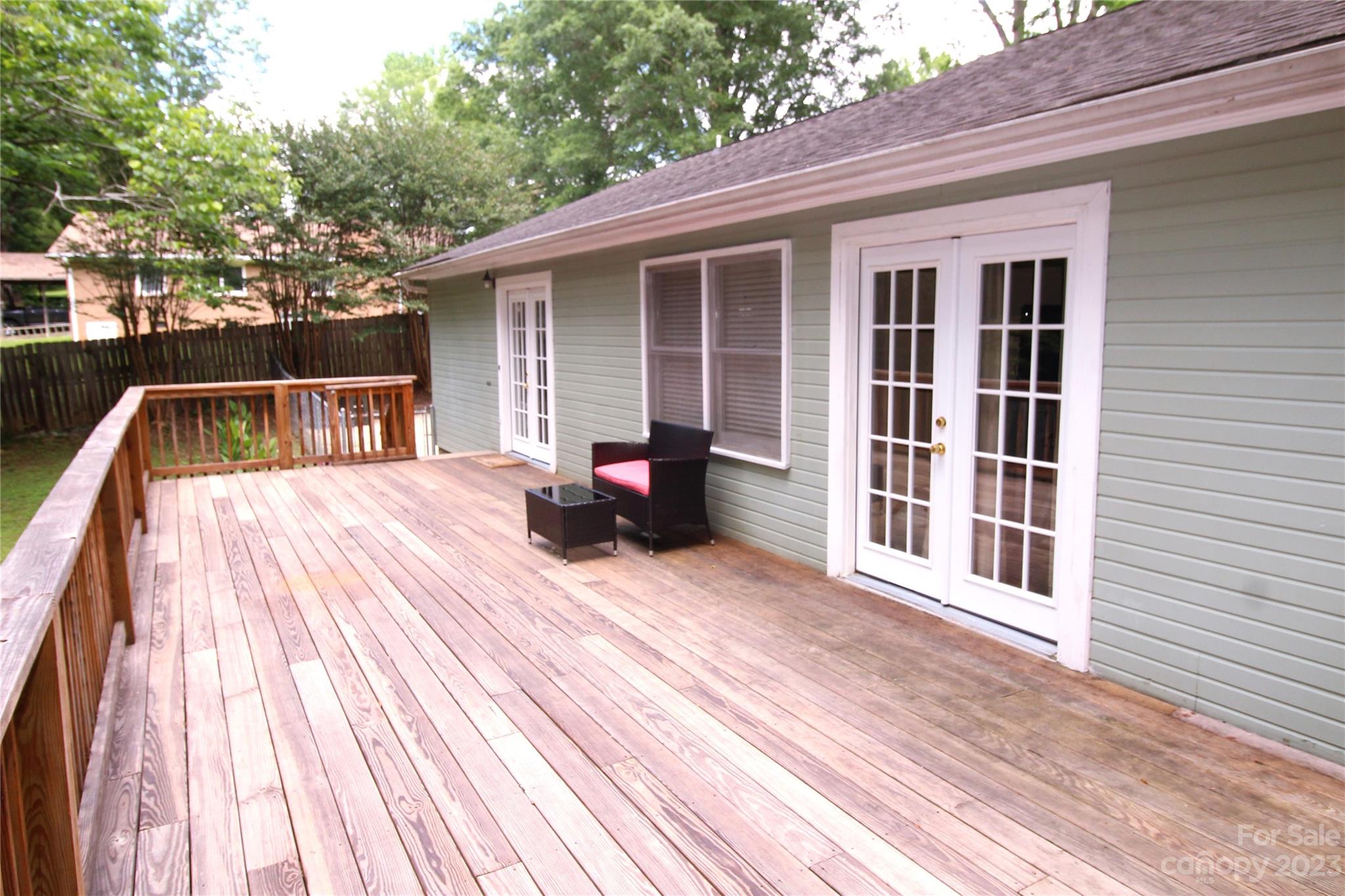 104 McCall Street Clover, SC 29710 - Photo 17 of 22 a view of a house with barbeque and sitting area