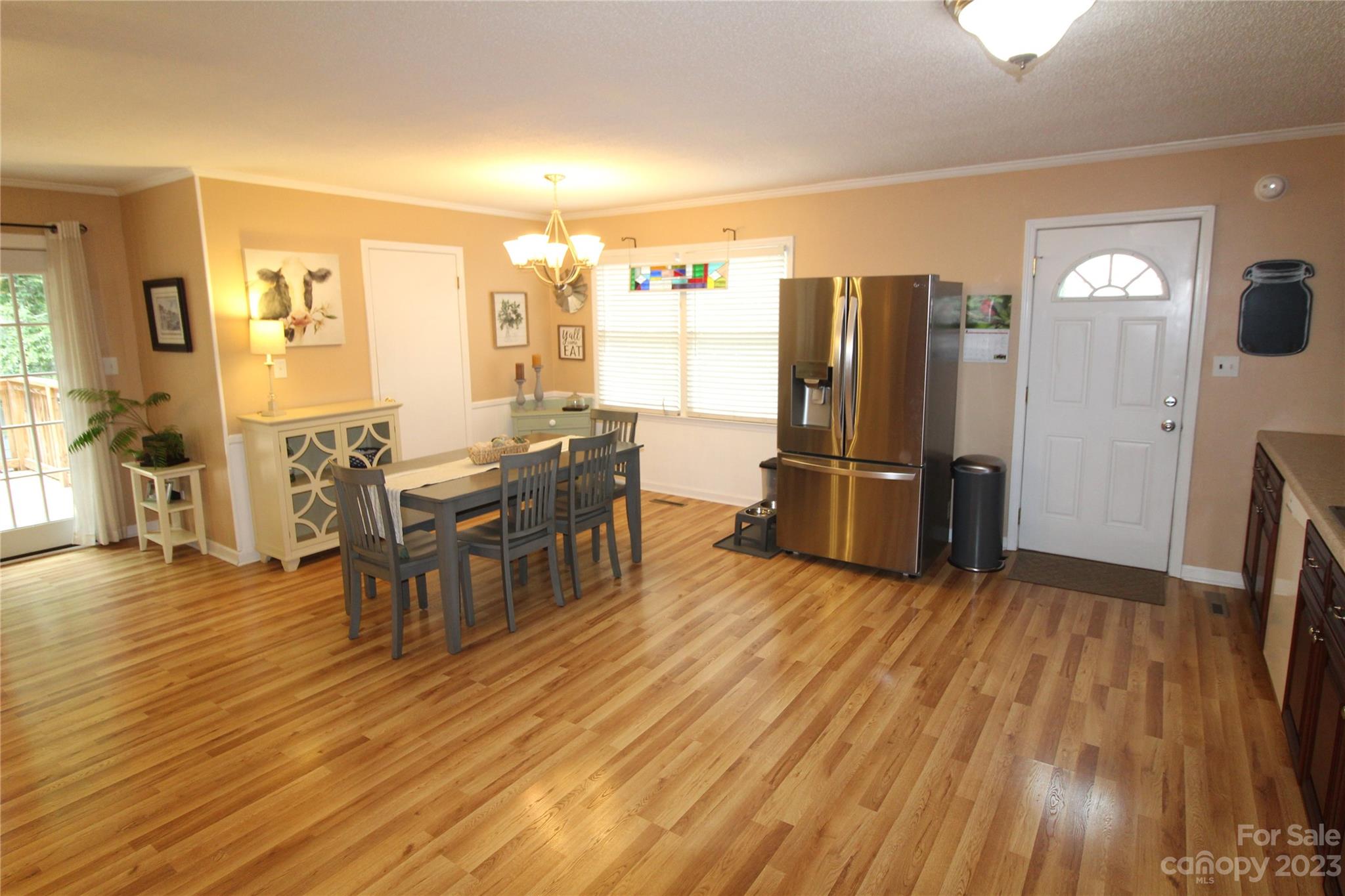 104 McCall Street Clover, SC 29710 - Photo 4 of 22 a view of a dining room with furniture and wooden floor