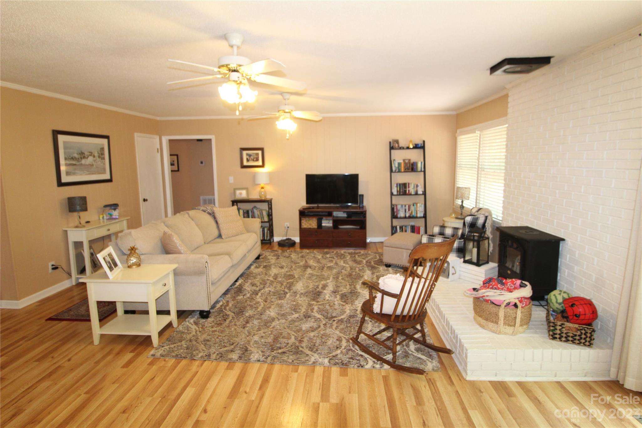 104 McCall Street Clover, SC 29710 - Photo 6 of 22 a living room with furniture and a flat screen tv