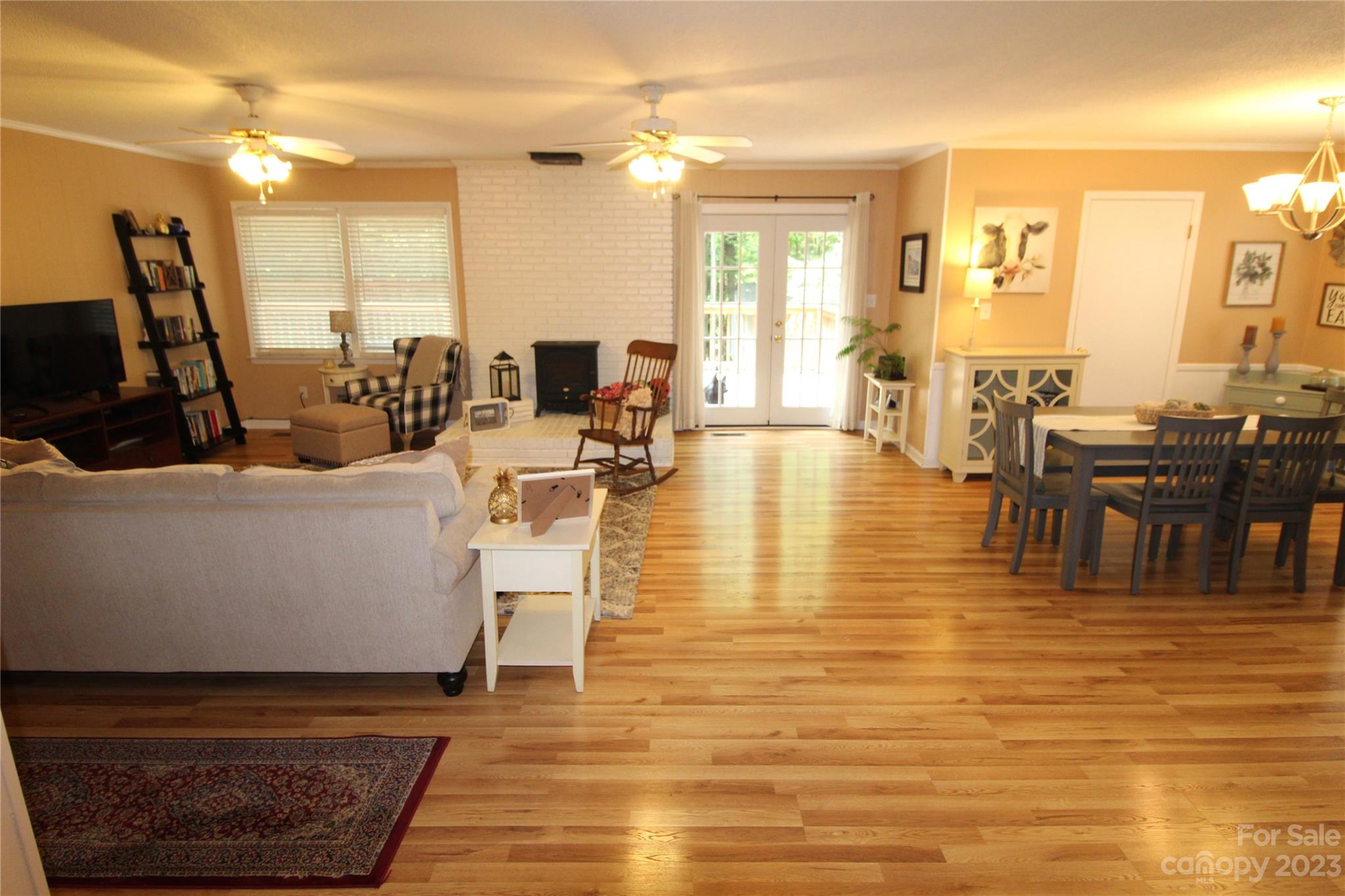 104 McCall Street Clover, SC 29710 - Photo 7 of 22 a living room with dining room and large windows