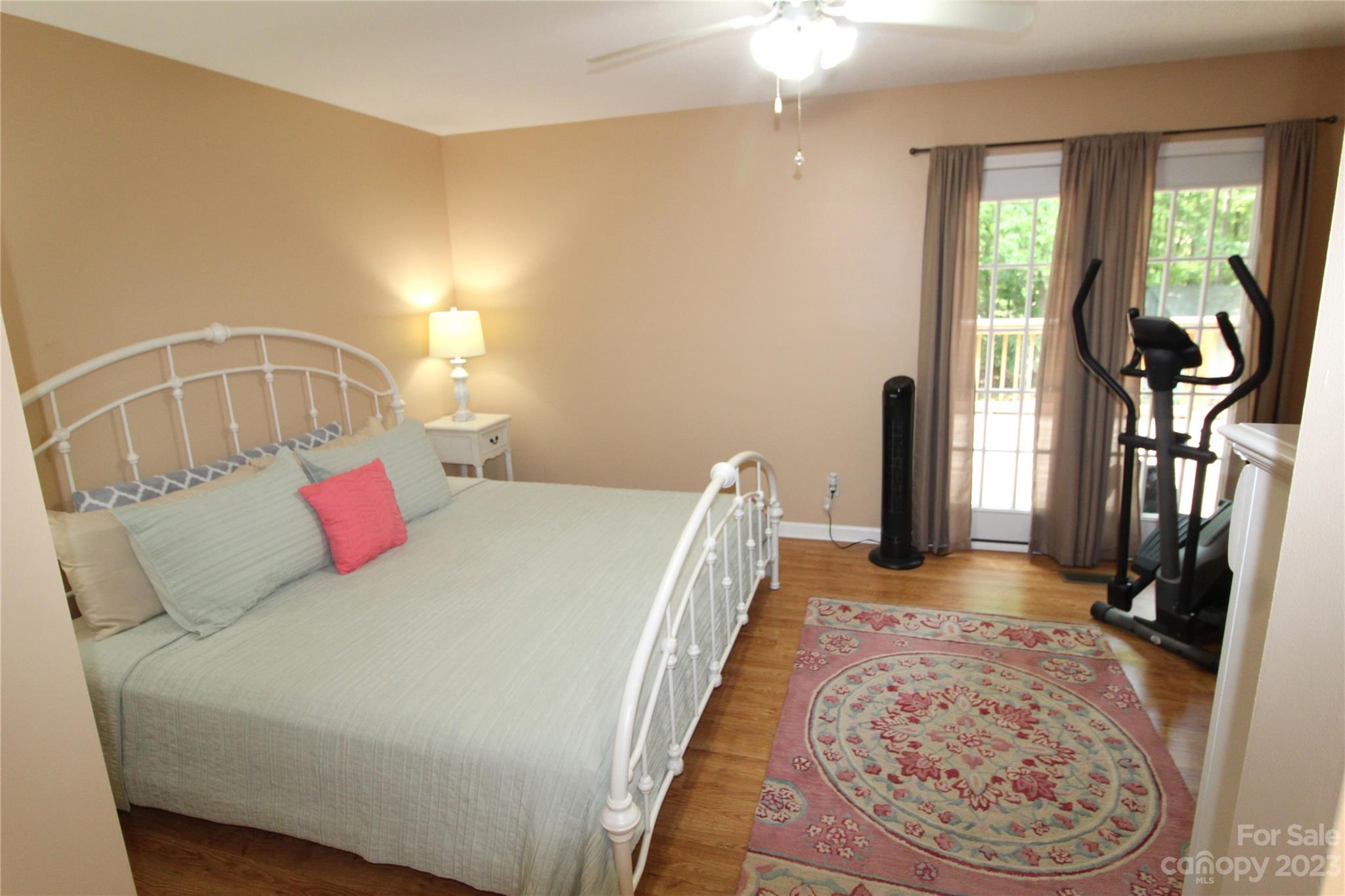 104 McCall Street Clover, SC 29710 - Photo 10 of 22 a living room with a bed furniture and a window