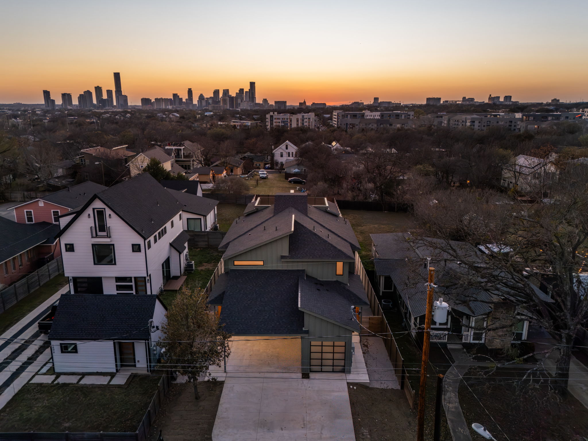 1610 Harvey Street, Unit 1 Austin, TX 78702 - Photo 32 of 39 Aerial view at dusk of a view of skyline