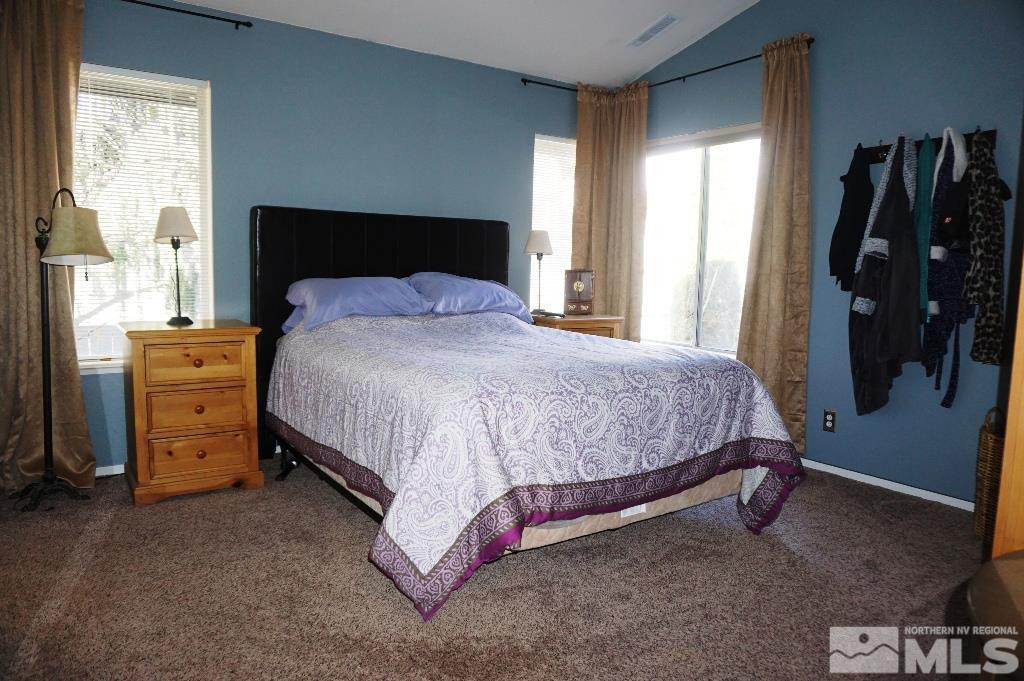 3005 Alpine Creek Road Reno, NV 89519 - Photo 16 of 25 a bedroom with a bed and dresser
