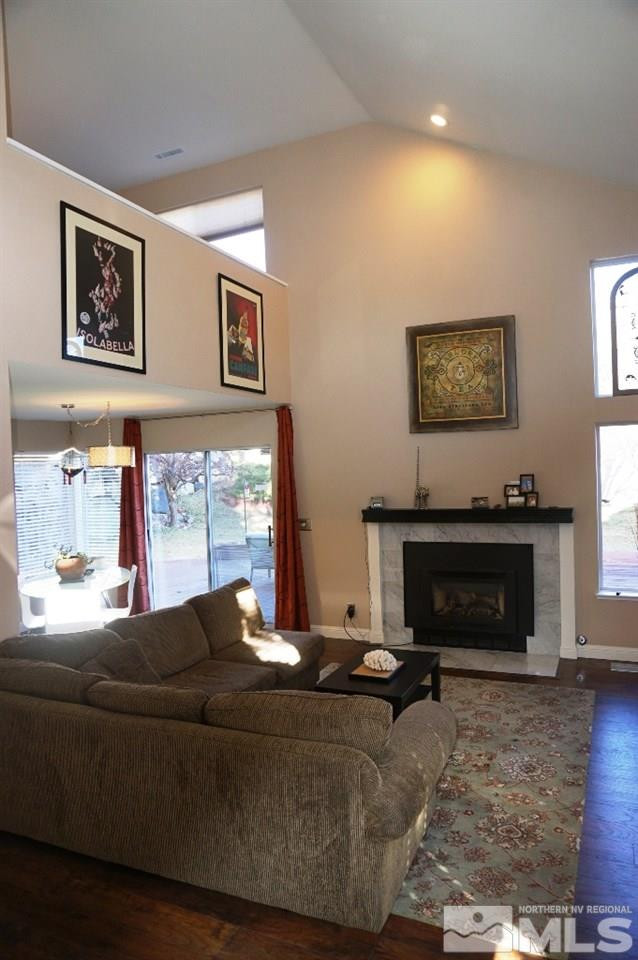 3005 Alpine Creek Road Reno, NV 89519 - Photo 6 of 25 a living room with furniture and a fireplace