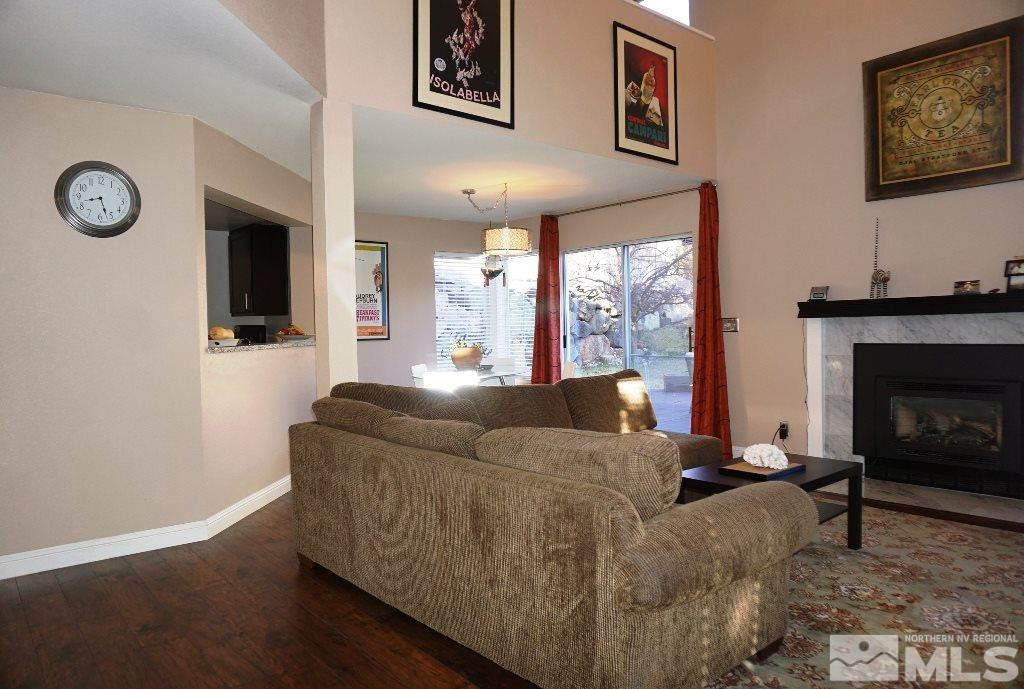 3005 Alpine Creek Road Reno, NV 89519 - Photo 7 of 25 a living room with furniture and a fireplace