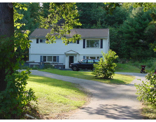 212 Greenwich Road Ware, MA 01082 - Photo 1 of 1 a front view of a house with swimming pool having outdoor seating