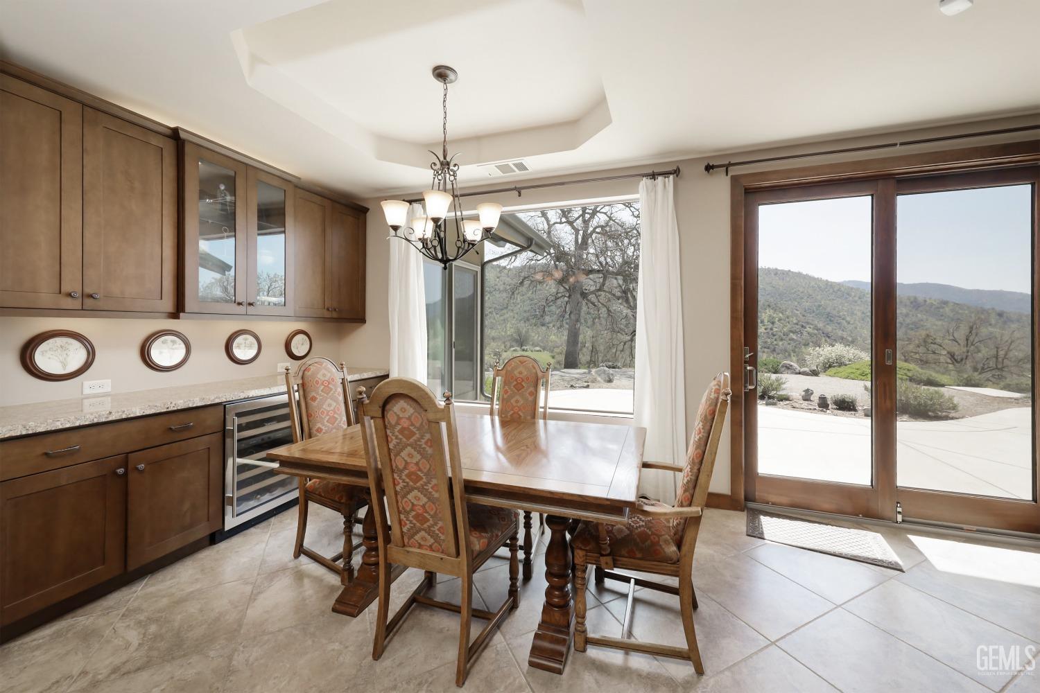 Undisclosed Address Bakersfield, CA 93308 - Photo 15 of 51 a view of a dining room with furniture window and outside view