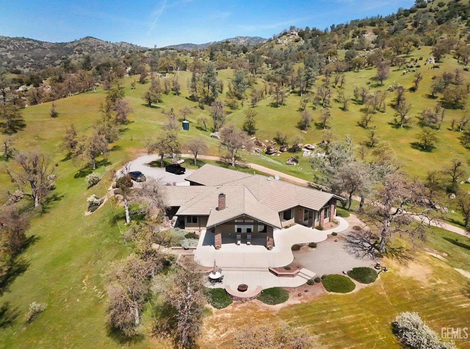 Undisclosed Address Bakersfield, CA 93308 - Photo 2 of 51 an aerial view of residential houses with outdoor space