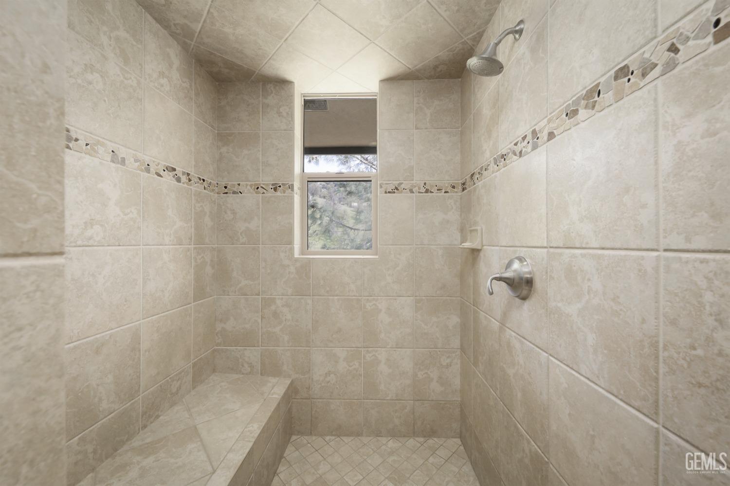 Undisclosed Address Bakersfield, CA 93308 - Photo 22 of 51 a bathroom with a shower