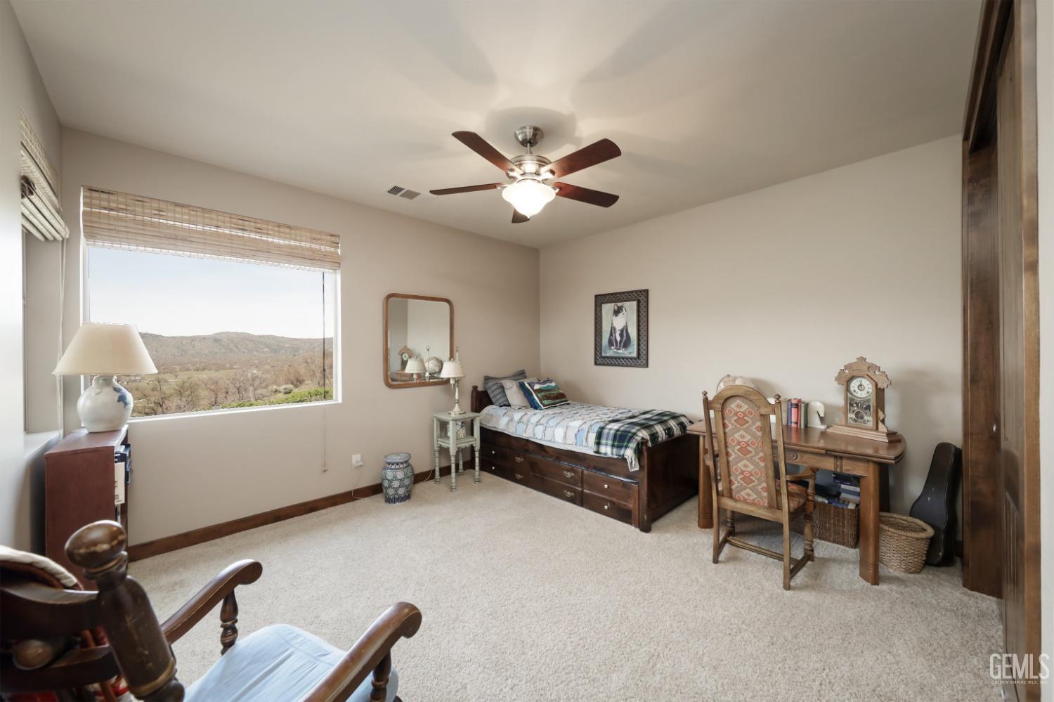 Undisclosed Address Bakersfield, CA 93308 - Photo 23 of 51 a living room with furniture