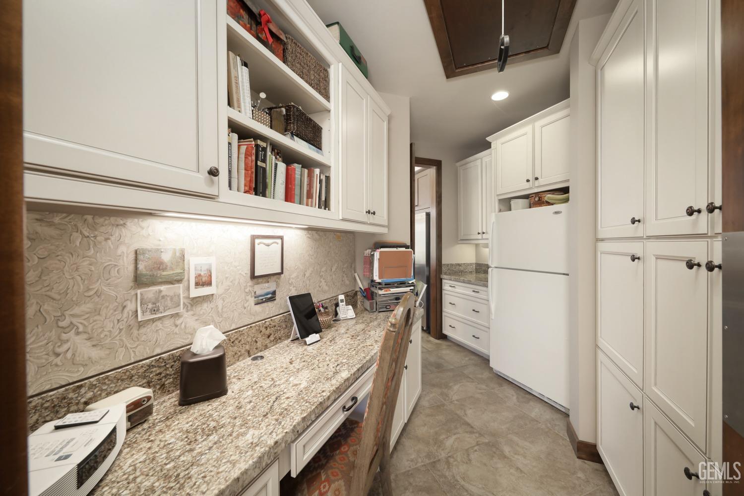 Undisclosed Address Bakersfield, CA 93308 - Photo 30 of 51 a kitchen with stainless steel appliances granite countertop a refrigerator and a sink
