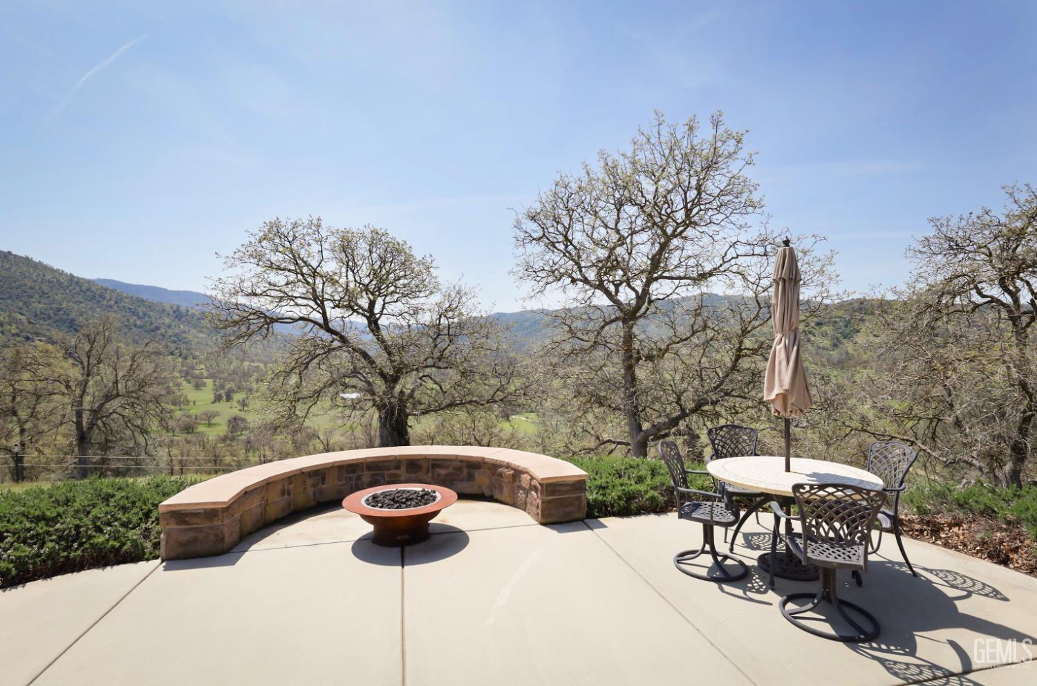 Undisclosed Address Bakersfield, CA 93308 - Photo 3 of 51 a view of a table and chairs in roof deck