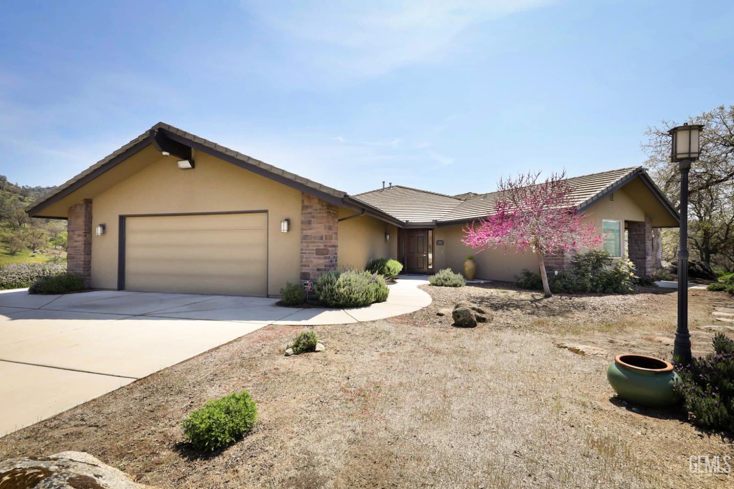 Undisclosed Address Bakersfield, CA 93308 - Photo 33 of 51 a front view of a house with yard