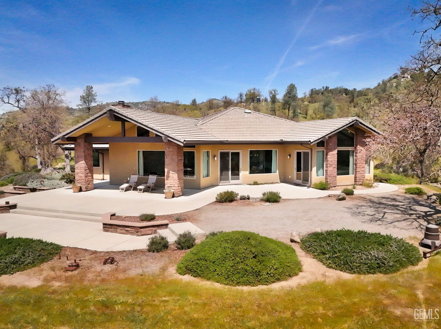 Undisclosed Address Bakersfield, CA 93308 - Photo 40 of 51 a view of a house with swimming pool and sitting area