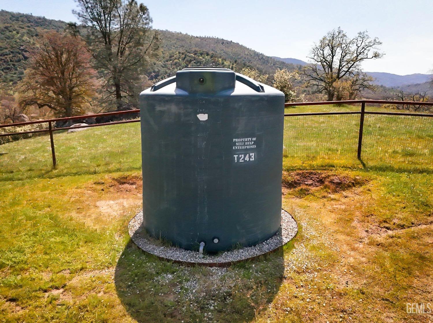 Undisclosed Address Bakersfield, CA 93308 - Photo 42 of 51 a view of a water fountain in front of a house