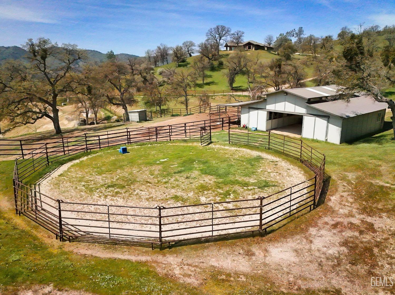 Undisclosed Address Bakersfield, CA 93308 - Photo 6 of 51 a view of a swimming pool with a lounge chairs